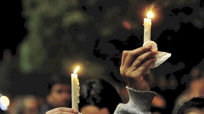 Encendido de velas en el Parque Hipólito Yrigoyen